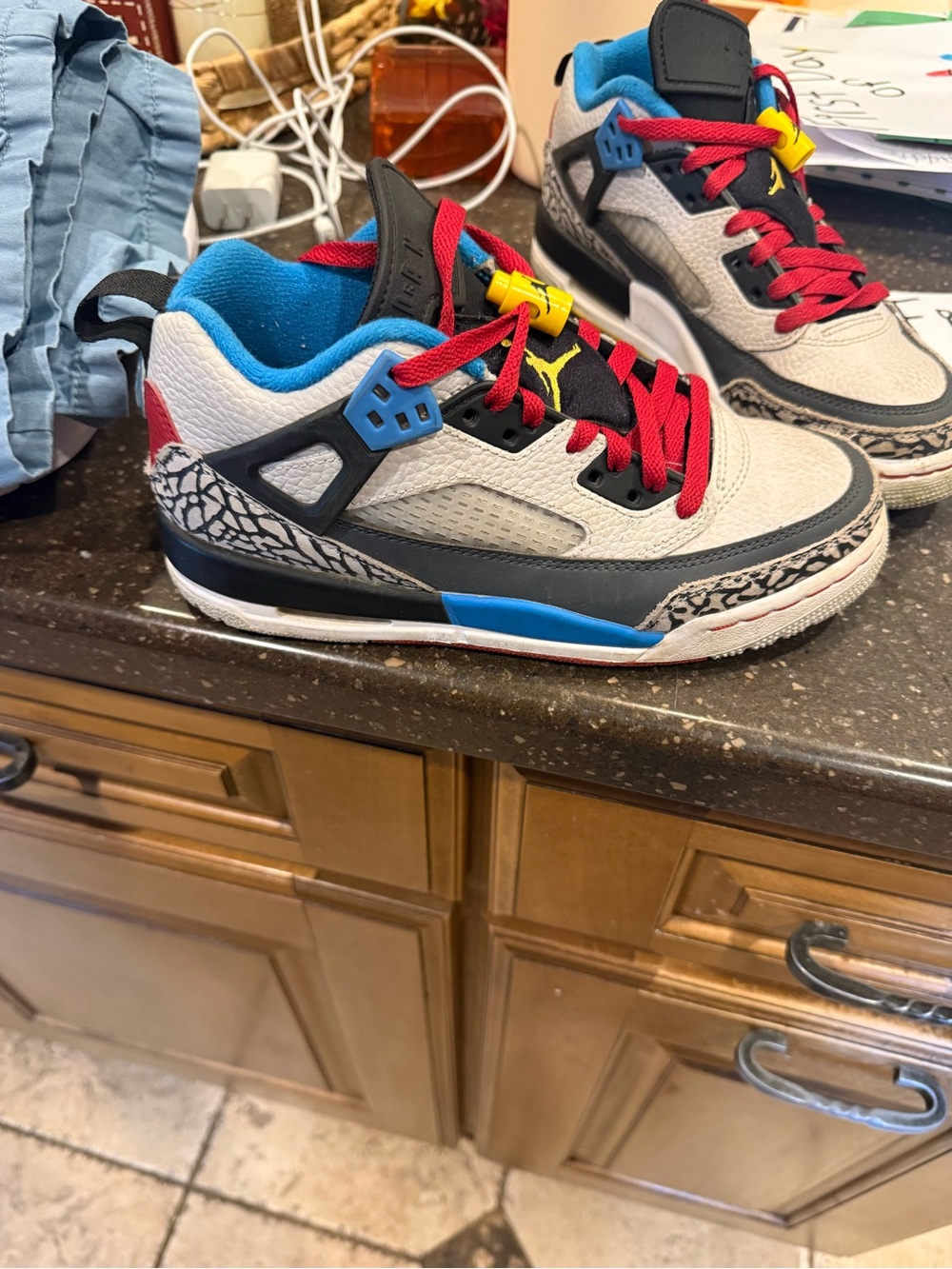 Jordan Kids Low-Top Sneakers in White, Red, Blue and Black